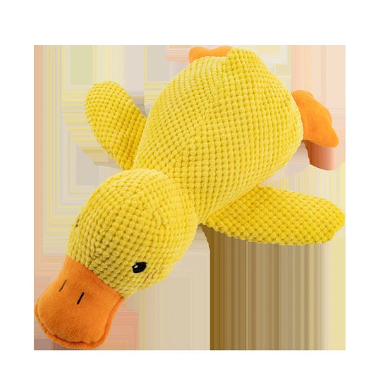 Yellow knitted duck toy against a neutral background