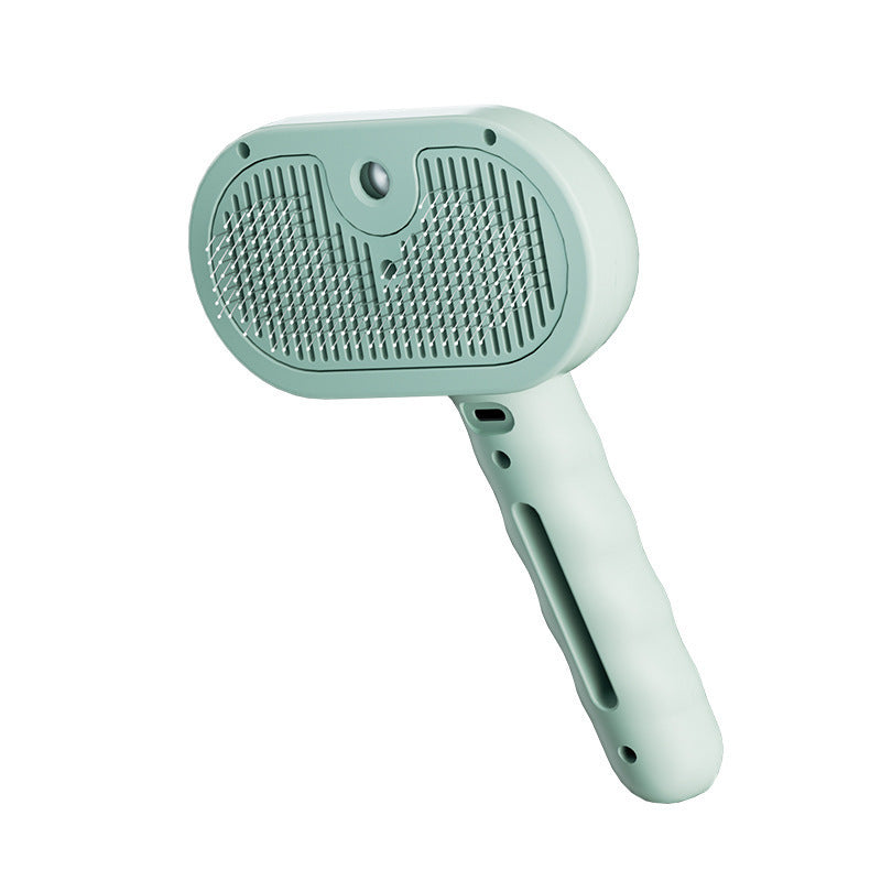 Mint green pet grooming brush on a white background