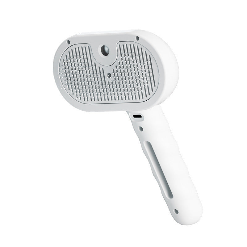 White pet grooming brush on a white background